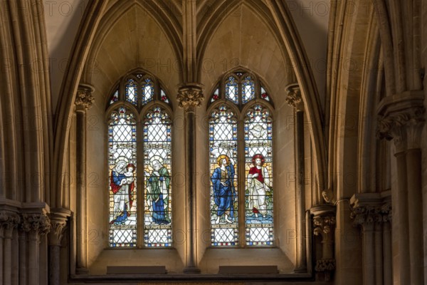 Wells, United Kingdom, 1 September, 2022: close-up view of a stained glass window inside the