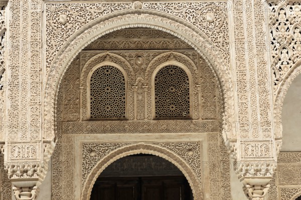 Alhambra, Granada, Andalusia, Spain, Fine arabesques and intricate architectural details in stone