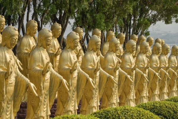 Smaller Buddha statues in the Great Buddha Land at the monastery of the Fo Guang Shan Buddha