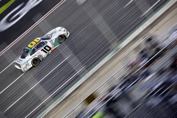 NASCAR Xfinty Driver, Justin Haley (10) races off turn four during the Alsco Uniforms 250 at the
