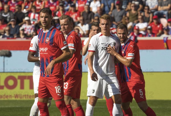 Football match, from left to right Marvin PIERINGER 1.FC Heidenheim, Lennard MALONEY 1.FC