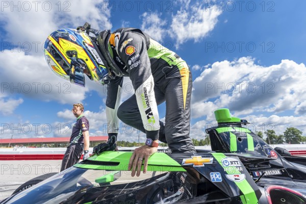 ROMAIN GROSJEAN (77) of Geneva, Switzerland prepares to practice for the Honda Indy 200 at Mid-Ohio