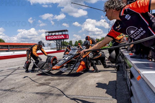 SANTINO FERRUCCI (14) of Woodbury, Connecticut comes down pit road for service during the Honda