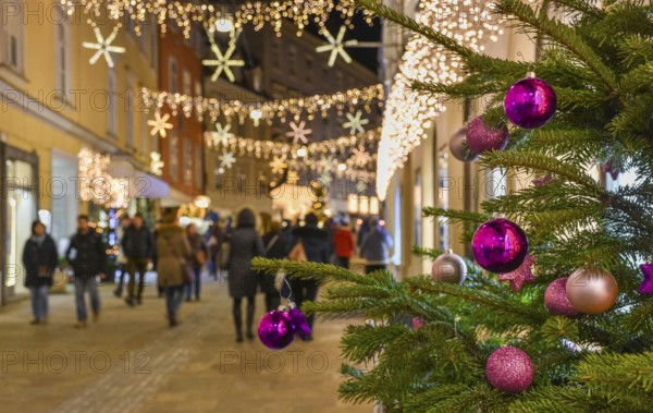 Beautiful Christmas decorations on Herrengasse street, at night, in the city center of Graz, Styria