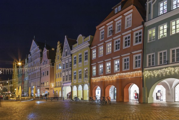 Historical houses on Altstadt street in Landshut in evening, Germany
