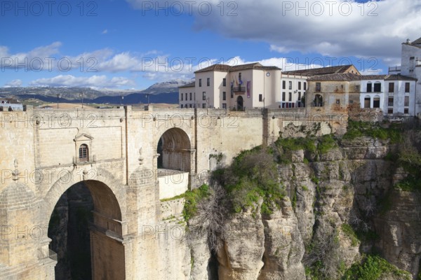 View of buildings in new town from other side of the 18th century bridge over the 300 ft Tajo Gorge