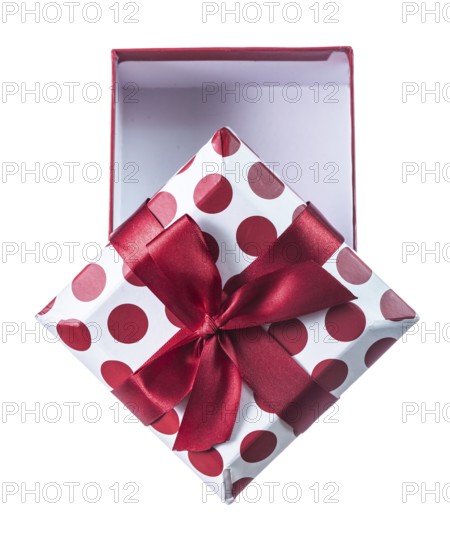 Opened red present box isolated on white
