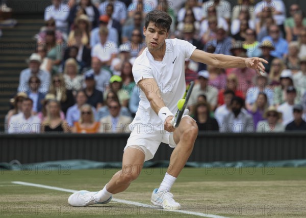 Spanish tennis player Carlos Alcaraz in action at the 2024 Wimbledon Championships, London,
