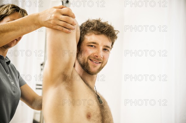 An image of a young man at the physio therapy