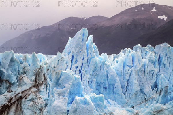 The glacier Perito Moreno. On the surface of the glacier formed Calgaspors - penitent firn.