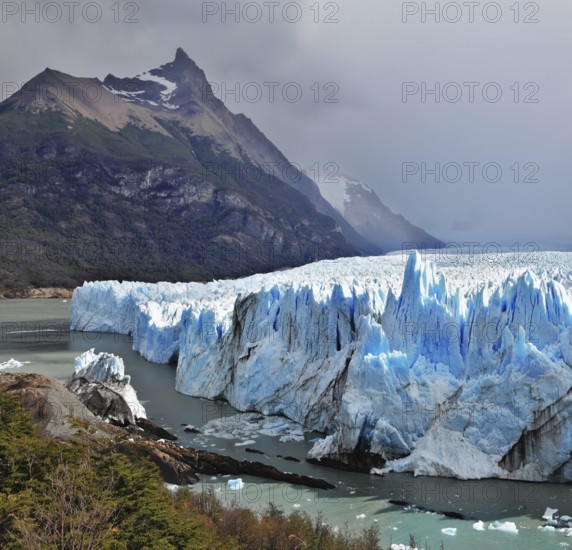 Colossal Perito Moreno glacier in Lake Argentino. Los Glaciares National Park in Argentina. Sunny