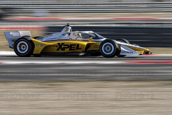 SCOTT MCLAUGHLIN (3) of Christchurch, New Zealand drives through the turns during a practice