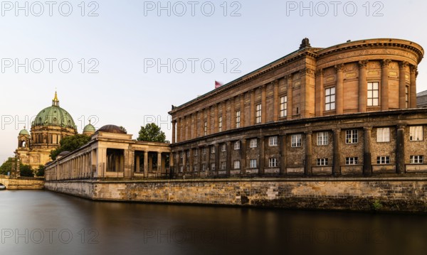 Scenic golden view of Spree river, Alte Nationalgalerie and Berlin Cathedral or Berliner Dom in