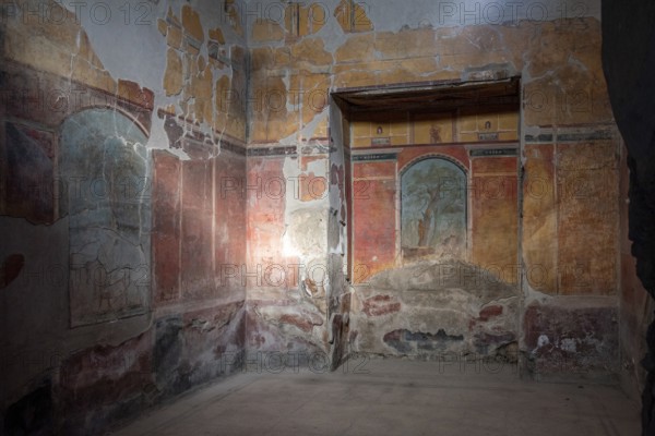OPLONTIS, ITALY, MAY 03, 2022, Scenic frescos on the wall of famous Villa Oplontis, ancient Roman