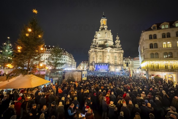 32nd Christmas Vespers and historic Christmas market on Neumarkt square in front of the