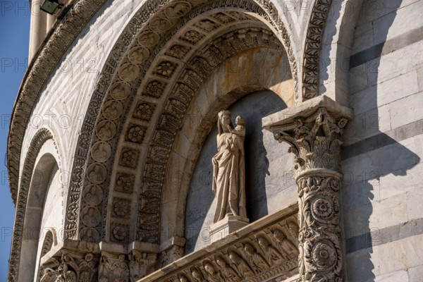 Madonna with child at the baptistery of the Pisa cathedral, Italy