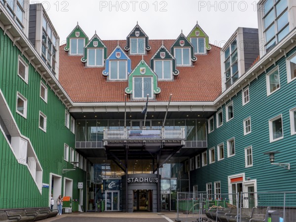 Green town hall (Stadhuis Zaanstad) with interesting 7 triangular pointed dormer windows, Zaandam,