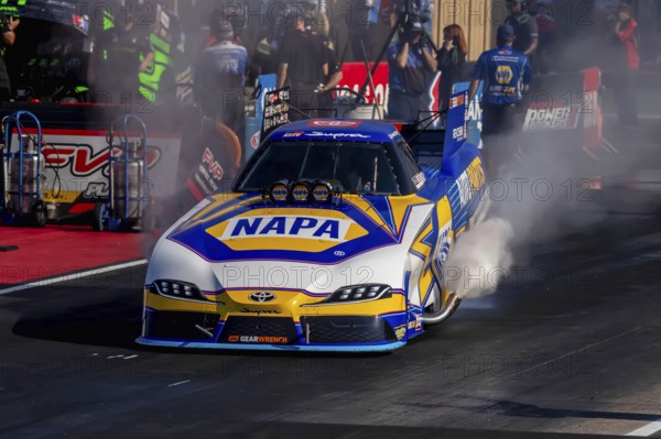 NHRA driver, Ron Capps, prepares to qualify for the Dodge Power Brokers NHRA Mile-High Nationals in