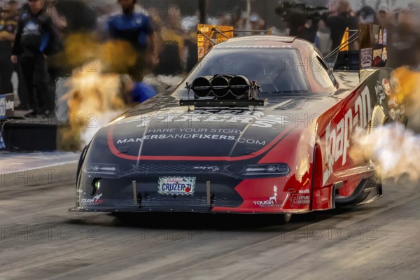 Sep 22, 2023-Concord, NC: NHRA Funny Car Series driver, Cruz Pedregon, runs down the lane during a