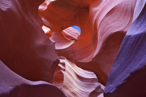 Graceful arches and a piece of blue sky in a magical canyon Antelope. Navajo Reservation, the