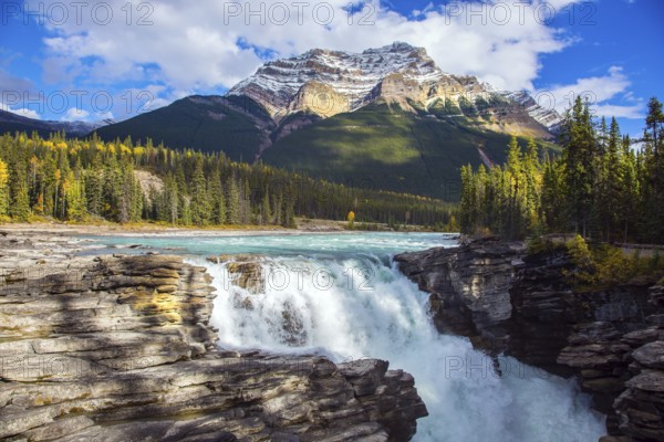Athabasca Falls, popular with tourists. Rocky Mountains of Canada. The Athabasca River begins at