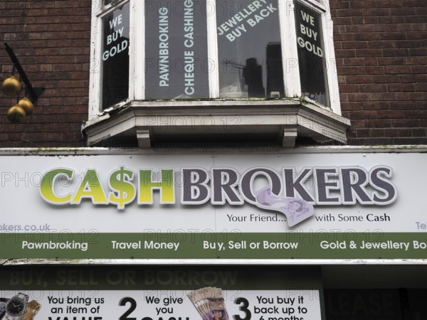 Chester. Cheshire, United Kingdom, 20 March 2024 : Sign above a cashbrokers pawn brokers and