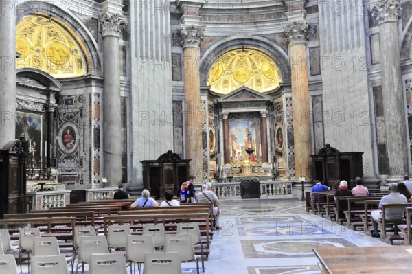St Peter's Basilica, Vatican, Rome, Lazio, Italy, Europe, Church chapel with decorated back wall of
