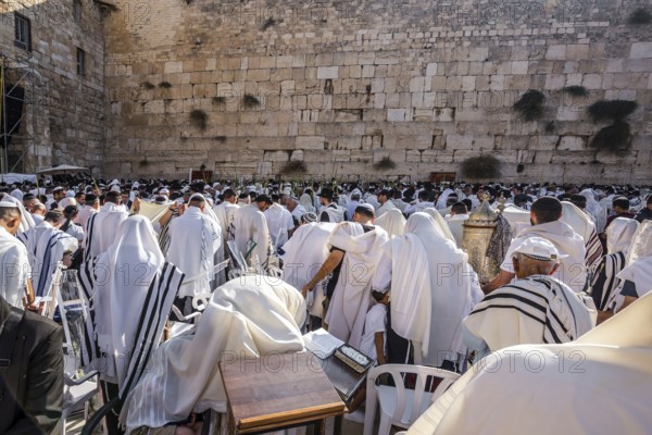 Blessing of the Cohenim in Passover. Jerusalem, Israel. Jews praying at the Western Wall wrapped in