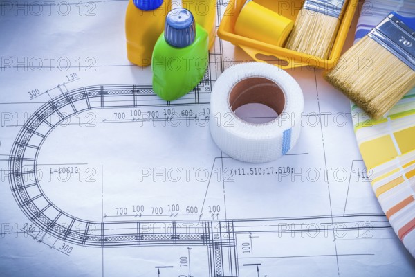 Construction drawing with paint brush roller tray bottles duct tape and color sampler maintenance