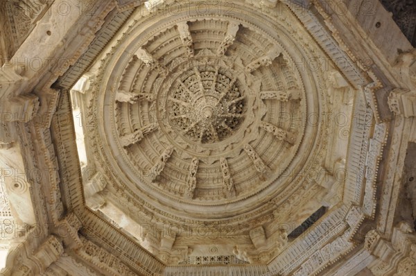 Ranakpur Temple, Ranakpur, Rajasthan, detail of an elaborately chiselled stone ceiling with complex
