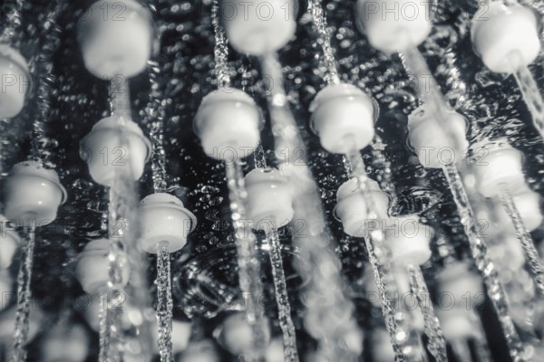 Shower head with running water closeup