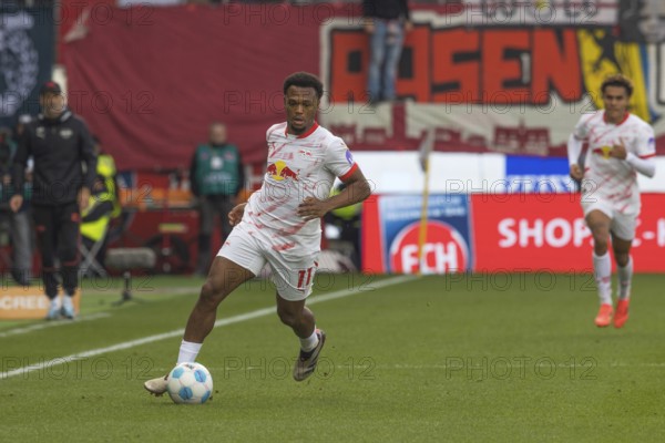 Football match, Lois OPENDA RB Leipzig elegant on the ball, Voith-Arena football stadium,