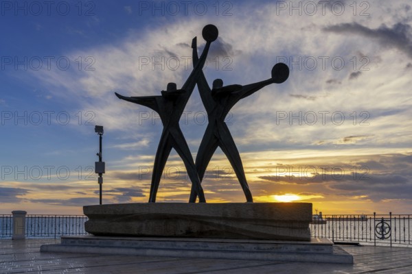 Taranto, Italy, 30 November, 2023: view of the Sailor Monument at the harbor entrance of Taranto at