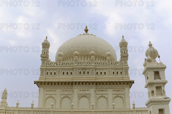 Mysore, Karnataka, South India, India, Asia, A detailed dome rises majestically against a cloudy