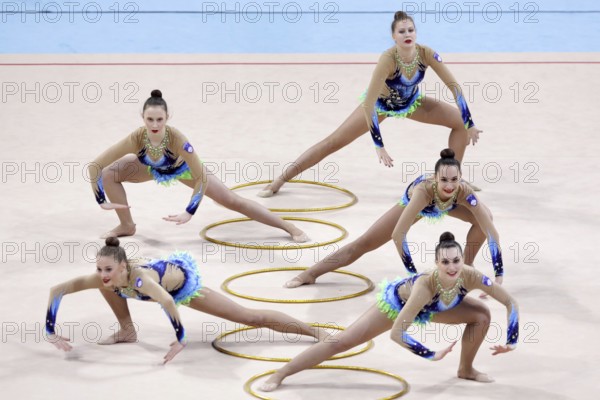 Sofia, Bulgaria - 30 March, 2018: Team Slovenia performs with hoops during Rhythmic Gymnastics