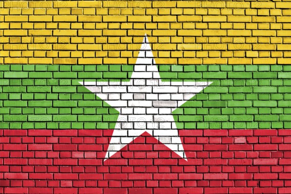 Flag of Myanmar painted on brick wall