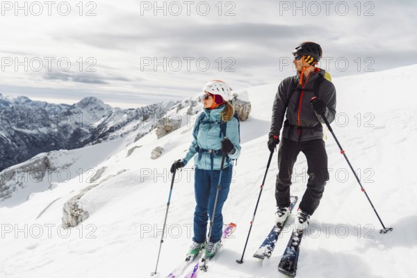 Mountaineer backcountry ski touring in the mountains. Ski touring in high alpine landscape with