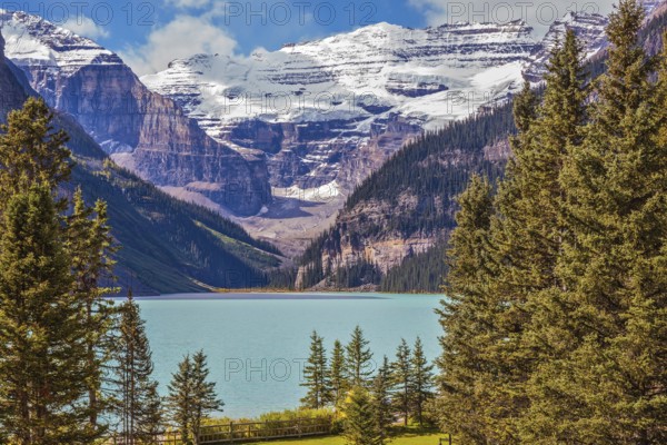 Banff National Park, Rocky Mountains, Canada. Emerald Lake is surrounded by mountains, glaciers and