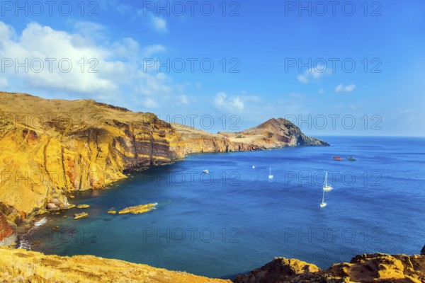 The west coast of Madeira - the bay between the rocks with yachts and boats. Madeira is island in