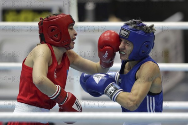 Sofia, Bulgaria - 26 February, 2021: Angelina Lukas (red) of Kazakhstan and Lacramioara Perijoc of