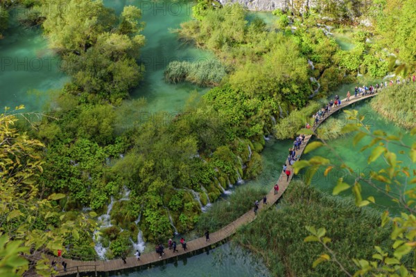 People walking on the trekking path at Plitvice Lakes National Park (Plitvi?ka Jezera), a national