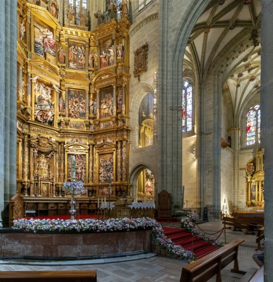 Astorga, Spain, 12 April, 2024: view of the altar and gilded altar piece in the central nave of the