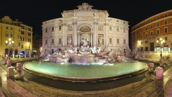 Panorama of Trevi Fountain without visitors at night. At 2:30 pm they closed the fountain for