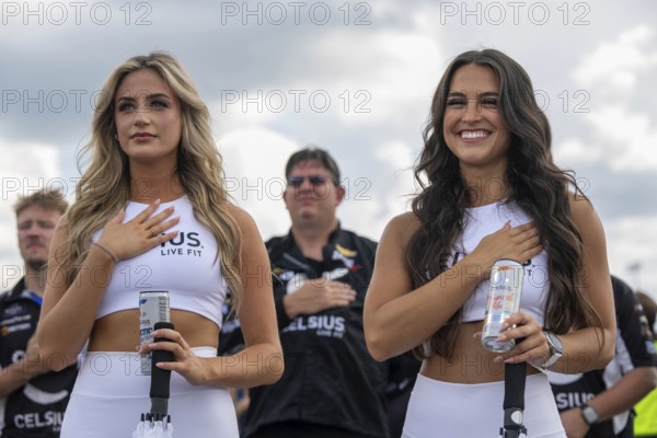 The CELSIUS Girls stand for the national anthem and prayer for the Tennessee Lottery 250 in