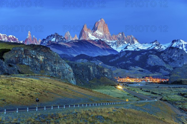 Early morning in the village of El-Chalten. Mountain peak in Patagonia. The grand crimson dawn over