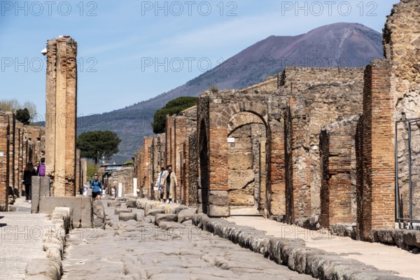 POMPEII, ITALY, MAY 04, 2022, Scenic view of ancient Pompeii, the Vesuvius volcano threatening in