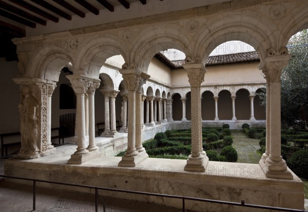 Aix en Provence, cloister of the cathedral. Romanesque cloister partial view left corner pillar