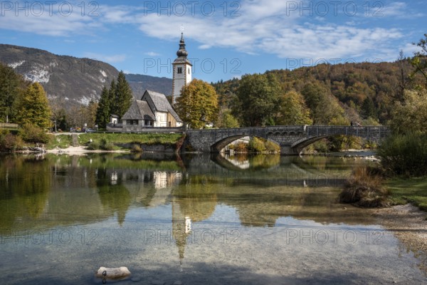 Old church St. John the Baptist at Lake Bohinj in the Triglav National Park, The Julian Alps,