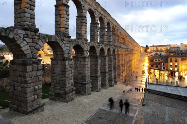 Roman aqueduct in the evening, historic city centre, UNESCO World Heritage Site, Segovia,