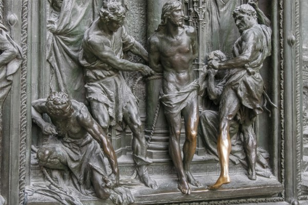 MILAN, ITALY/EUROPE - FEBRUARY 23 : Detail of the main door at the Duomo Cathedral in Milan Italy